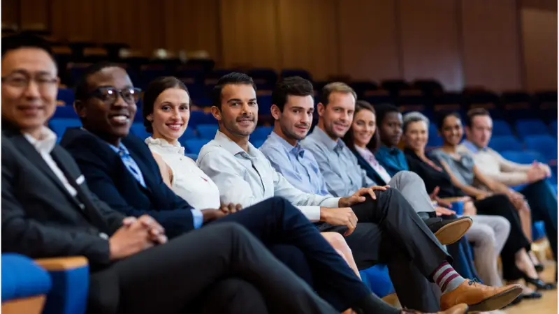 Executives participating in a leadership and management training session to improve strategic decision-making.